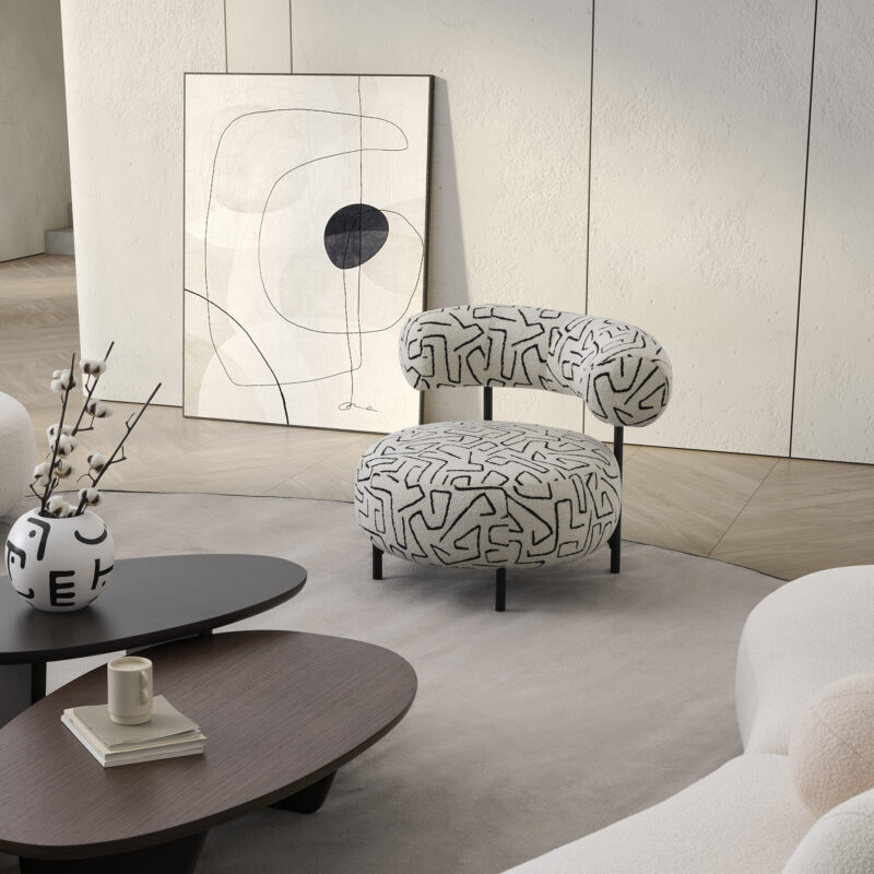 cute round bon bon accent armchair with white patterned fabric for contemporary living rooms
