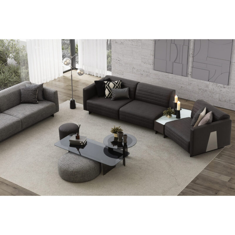 black leather modular sectional sofa in a modern contemporary living room with glass rectangular coffee table set
