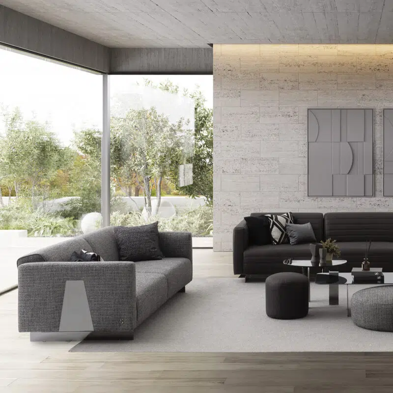 Modern luxury living room with designer sectional sofas by LEOPARD Furniture, featuring large windows and abstract wall art.