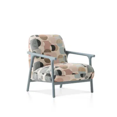 A colorful and vibrant armchair with wooden legs, perfect for adding a touch of playfulness to your living space