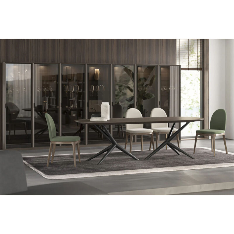 egg dining chair in a modern dining room with luis dining table and luis cabinets