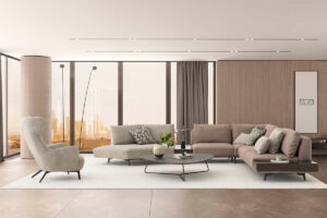 The Loft Modular Sofa in a modern living space with a off white rug and a minimalist coffee table