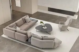 The Loft Modular Sofa in a modern living space with a off white rug and a minimalist coffee table