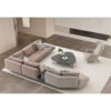 The Loft Modular Sofa in a modern living space with a off white rug and a minimalist coffee table