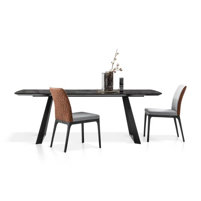 Contemporary dining set with sleek black table and modern chairs on white background by LEOPARD Furniture Canada.