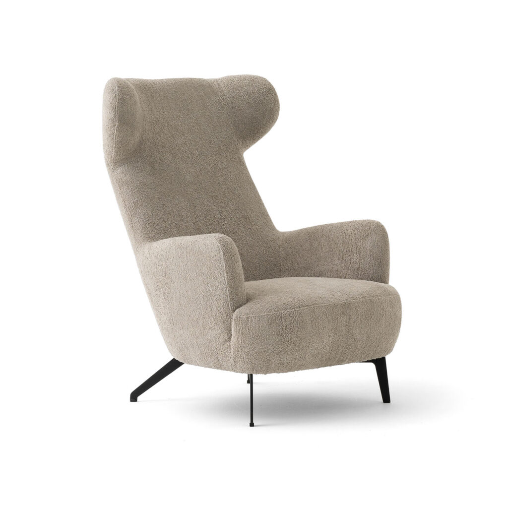 Luxury high-back accent chair in boucle fabric on a white background from LEOPARD Furniture Canada.