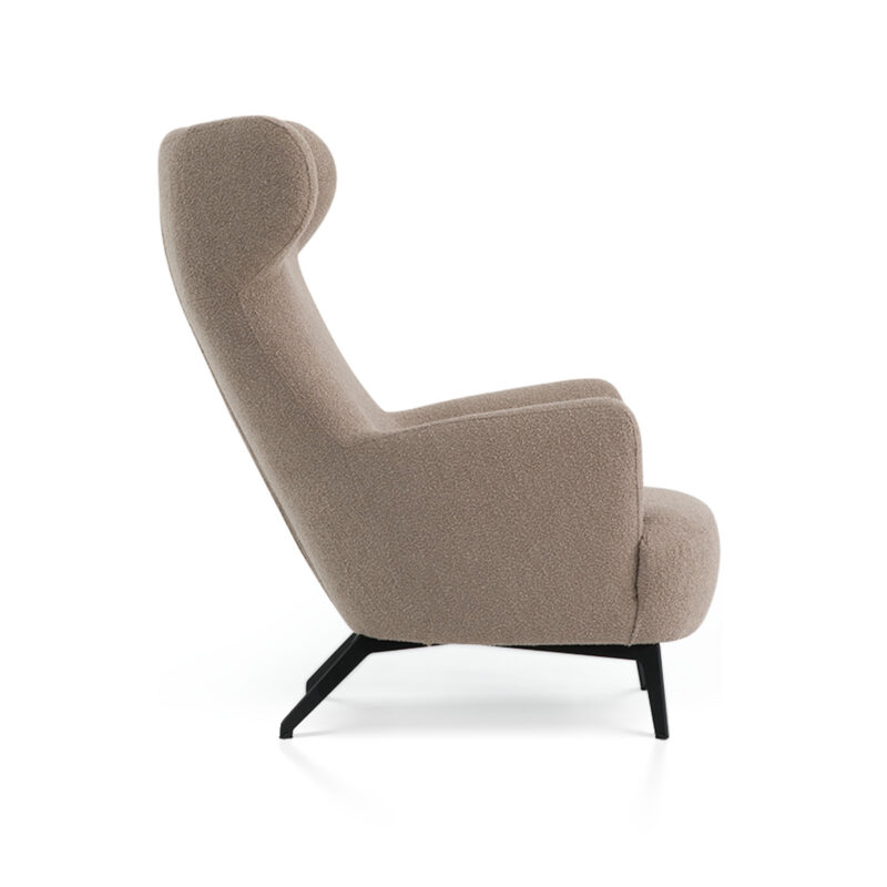 Side view of the Panda High Wingback Armchair showcasing its sleek lines