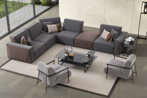 Cavalli Modular Sofa - pouf module in modern living room with grey fabric and brown leather for the sides and back