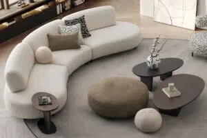 Barcelona Coffee Tables and bon bon modular sofa in a modern living room with oval shapes and clean curved lines