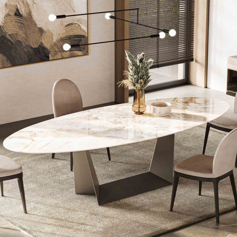 luxury oval stone dining table in a contemporary warm dining room setup