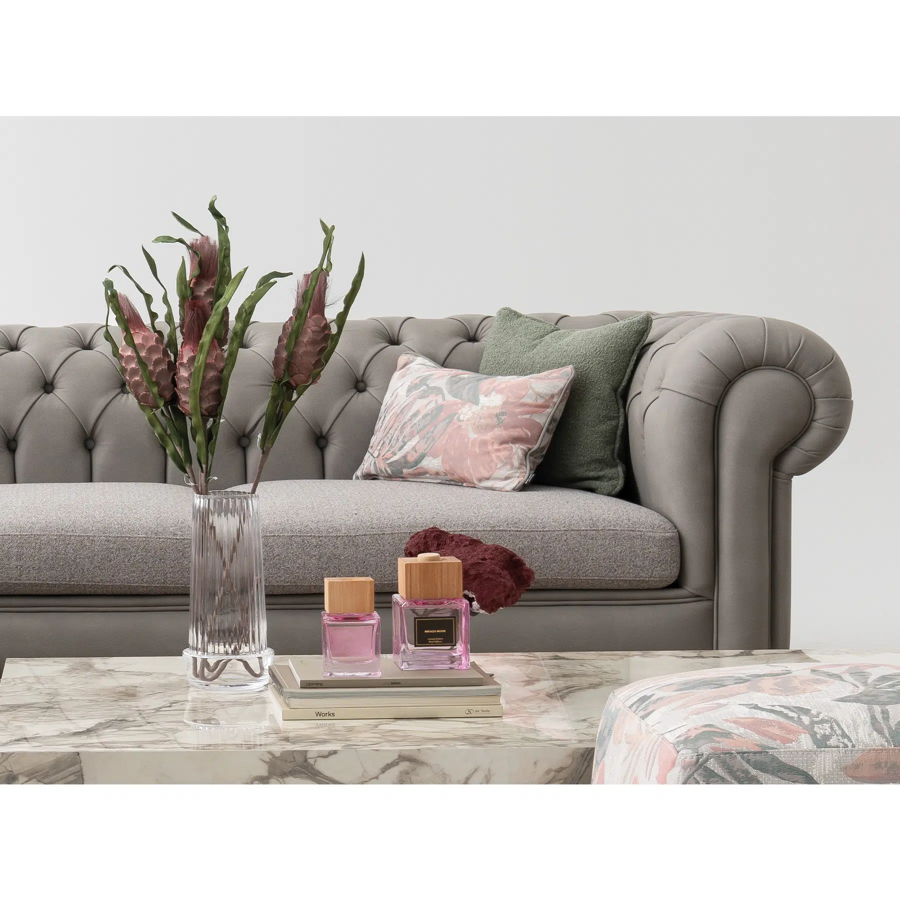 aspendos tufted chesterfield sofa in light gray leather close up view