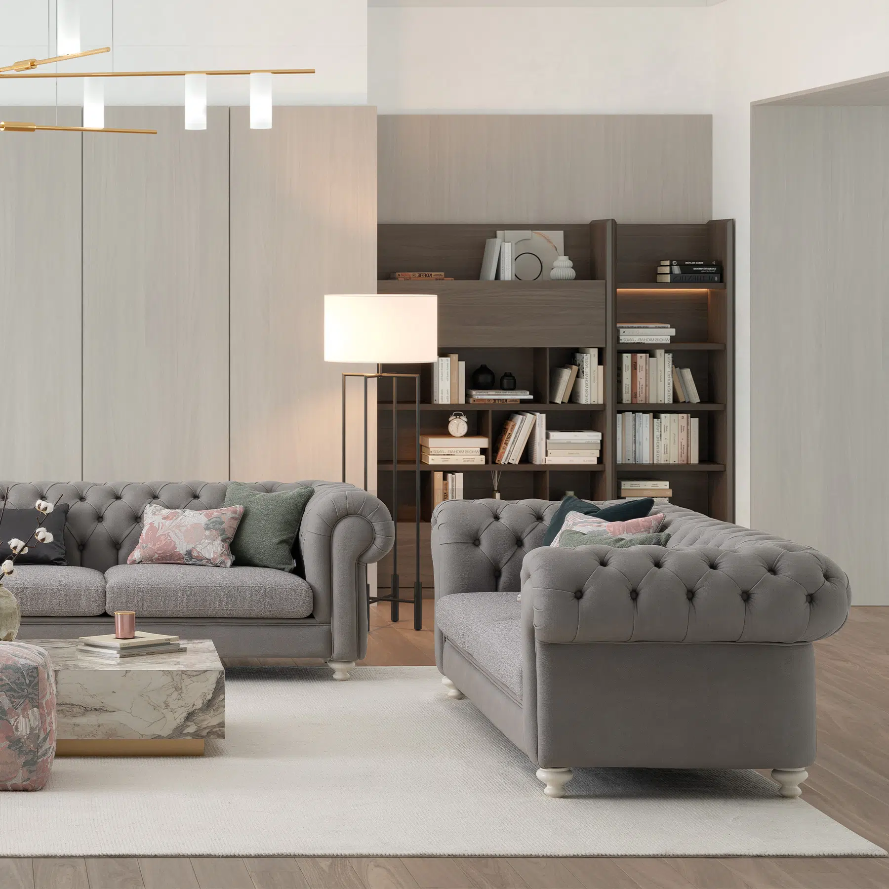 ensemble canapé chesterfield en tissu gris clair dans un salon de luxe