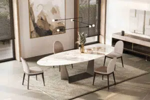 luxury oval stone dining table in a contemporary warm dining room setup