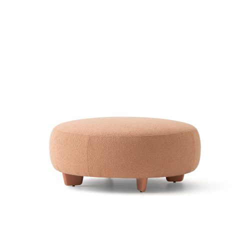 big round salmon pink ottoman with legs bon bon