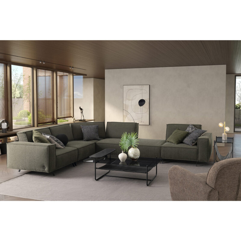 warm contemporary living room setup with cubic modular sofa cavalli in green fabric upholstery