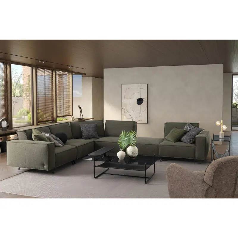 warm contemporary living room setup with cubic modular sofa cavalli in green fabric upholstery