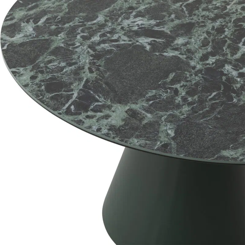 green ceramic round dining table closeup view