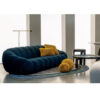 Contemporary dark blue sofa with mustard cushions in modern living room by LEOPARD Furniture, Canada.