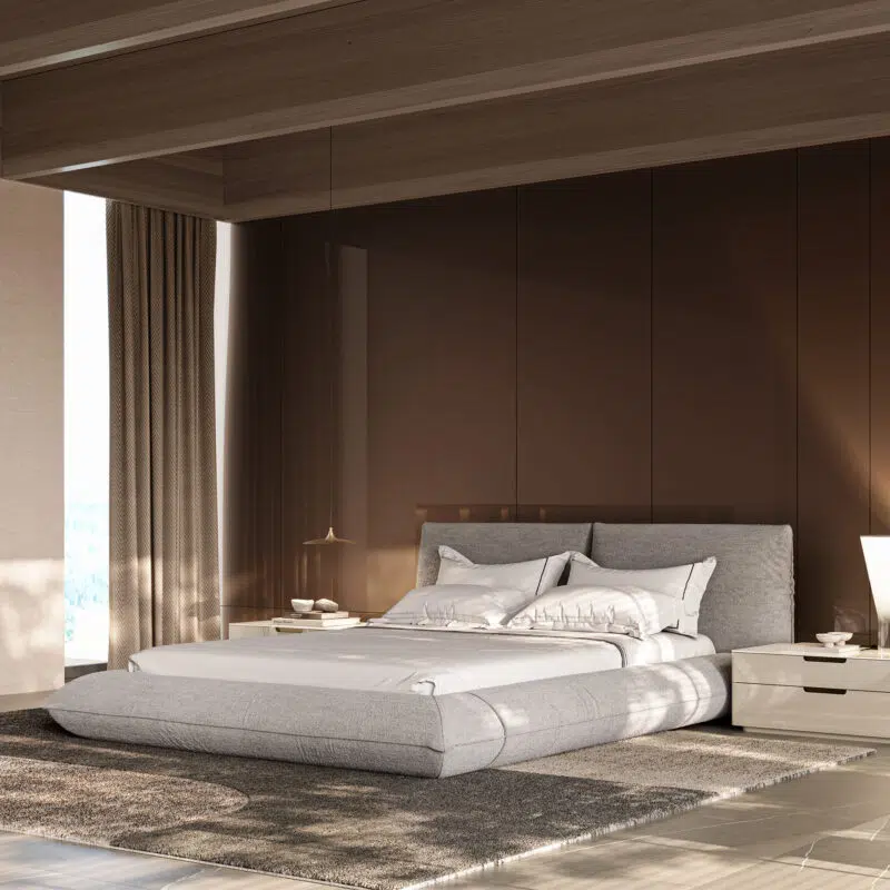 contemporary upholstered bed in light gray fabric in a well designed bedroom