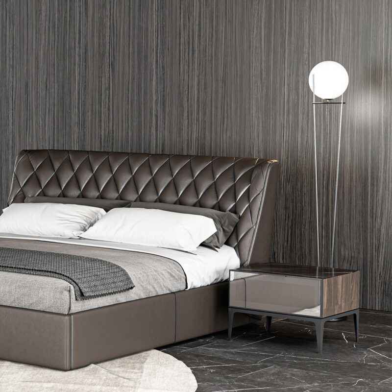 bedside table contemporary design glass and metal with a black leather tufted bed
