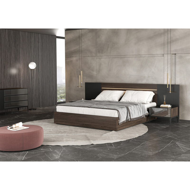contemporary bedroom design with a wide bed concrete wall and a round gray area rug