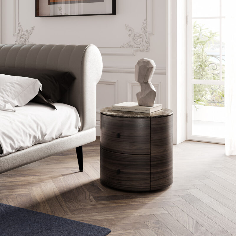 beautiful round nightstand black stone top in a bright bedroom