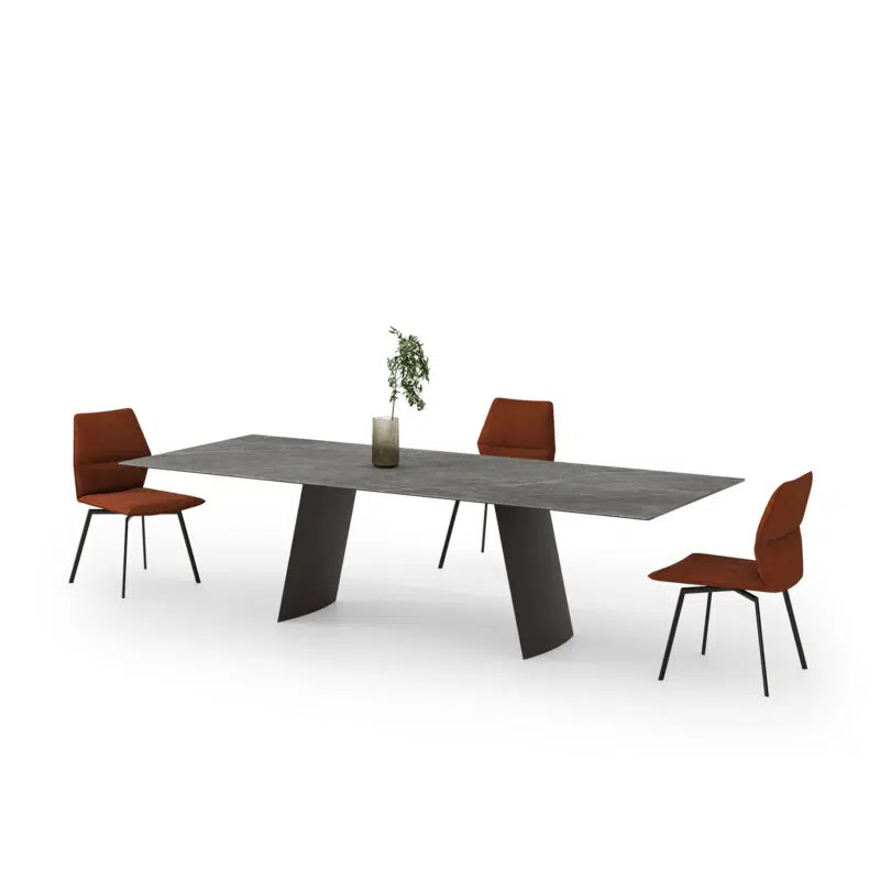 Modern dining table set with grey stone top and rust chairs on white background, LEOPARD Furniture Canada.