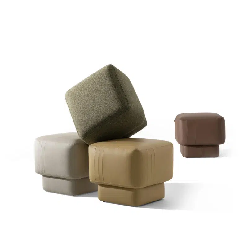 Luxurious cube ottomans in earth tones on white background, perfect for modern interiors by LEOPARD Furniture Canada.