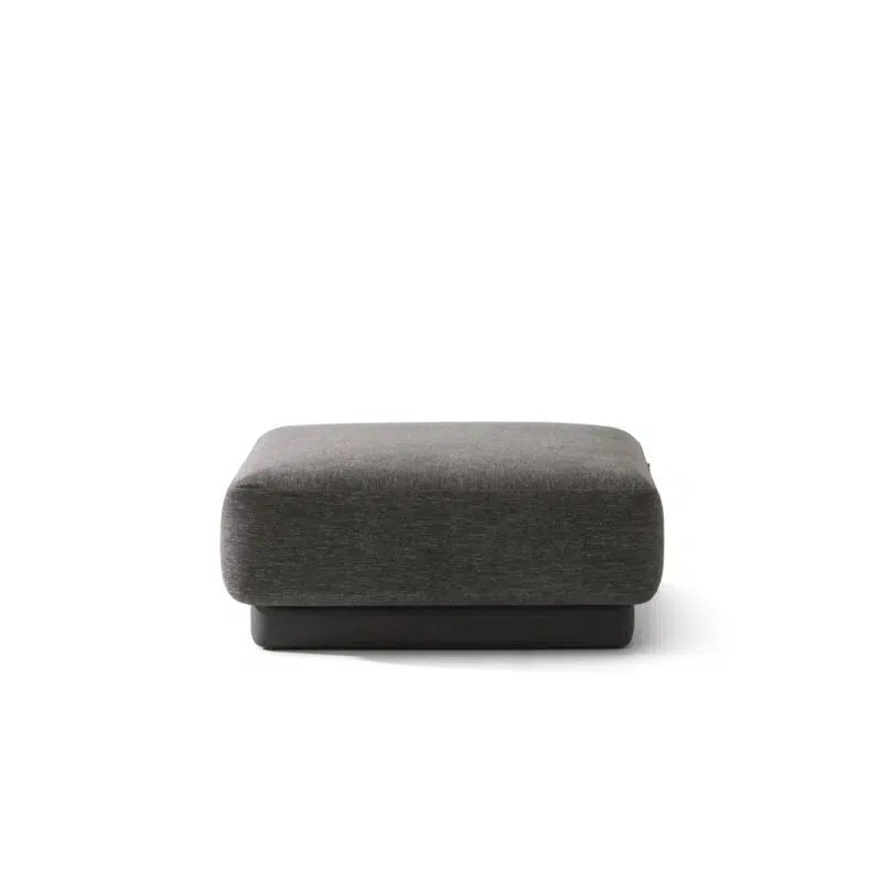 Sleek grey ottoman on white background, perfect for modern living rooms. High-end design by LEOPARD Furniture Canada.