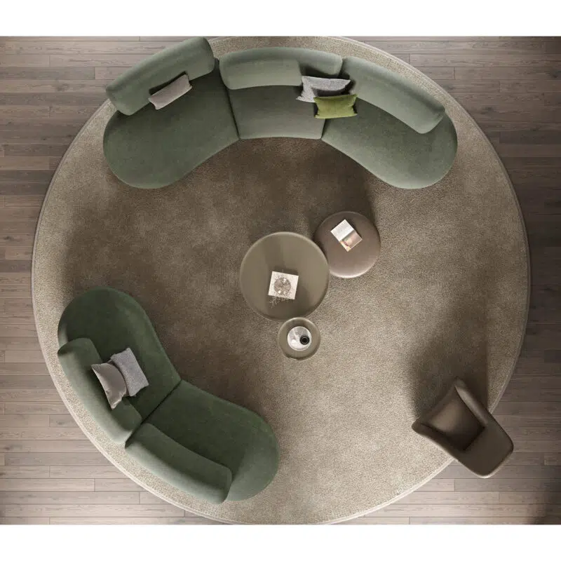 Élégant canapé sectionnel circulaire avec tapis rond et tables basses au design contemporain par Meubles LEOPARD Canada.