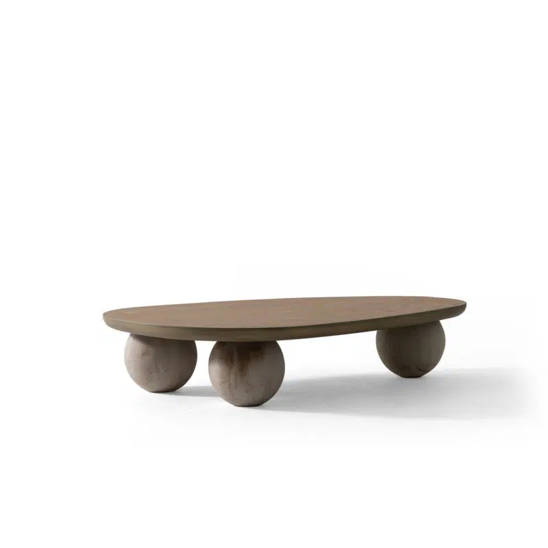 Sleek oval coffee table with spherical legs on white background, from LEOPARD Furniture's luxury collection.