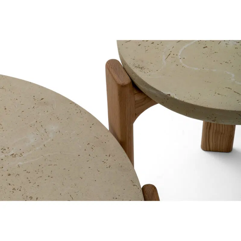 Modern nesting coffee tables with travertine tops and oak legs on a white background from LEOPARD Furniture Canada.