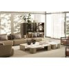 Luxurious modern living room with plush beige sofas and elegant coffee table at LEOPARD Furniture's high-end Canadian store.
