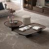Modern dark wood coffee tables in a minimalist living room by LEOPARD Furniture, Canada’s top interior designer.