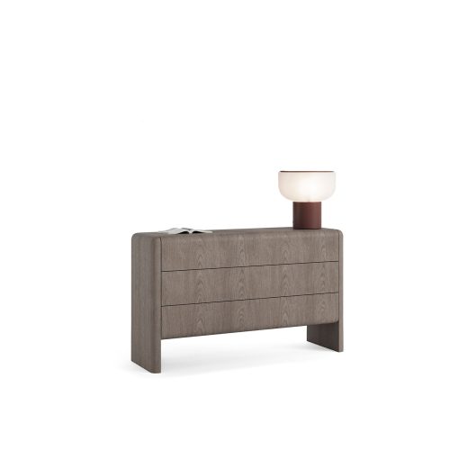 Modern three-drawer wooden dresser with lamp on white background from LEOPARD Furniture, high-end Canadian interior design.