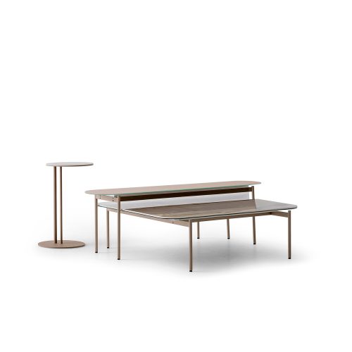 Modern nesting coffee tables with sleek metal frames from LEOPARD Furniture on a white background.