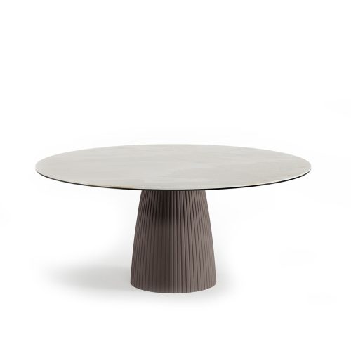 Round modern dining table by LEOPARD Furniture on white background, minimalist design for elegant interiors.