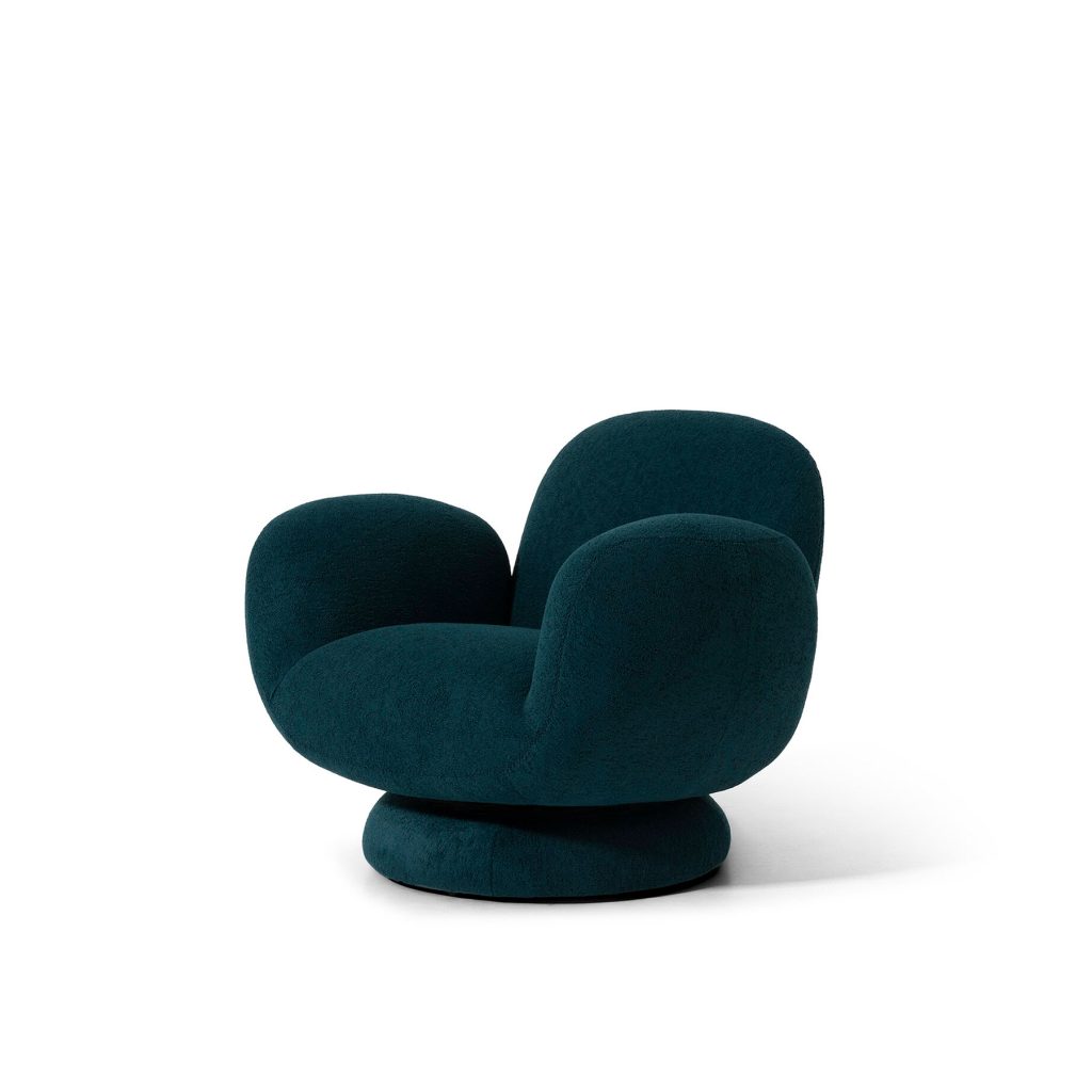 Modern velvet lounge chair on white background by LEOPARD Furniture, Canada's top interior designer. Luxurious seating option.