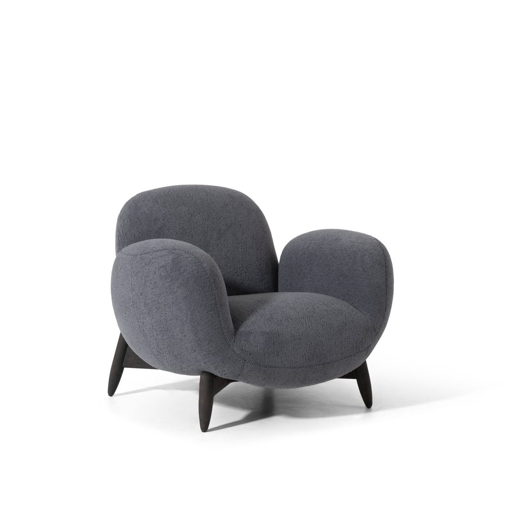 Luxurious modern gray armchair by LEOPARD Furniture on white background, perfect for contemporary interiors.