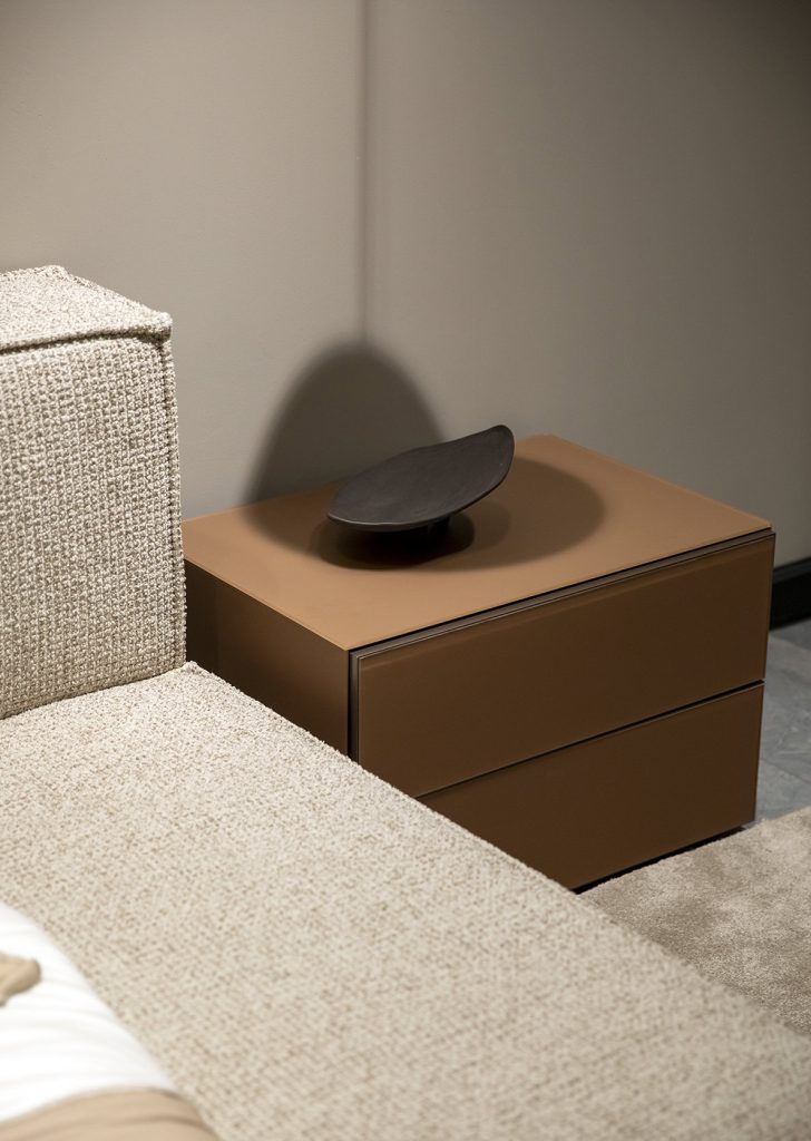 Modern bedside table in luxurious Canadian interior design by LEOPARD Furniture. Elegant bedroom decor.