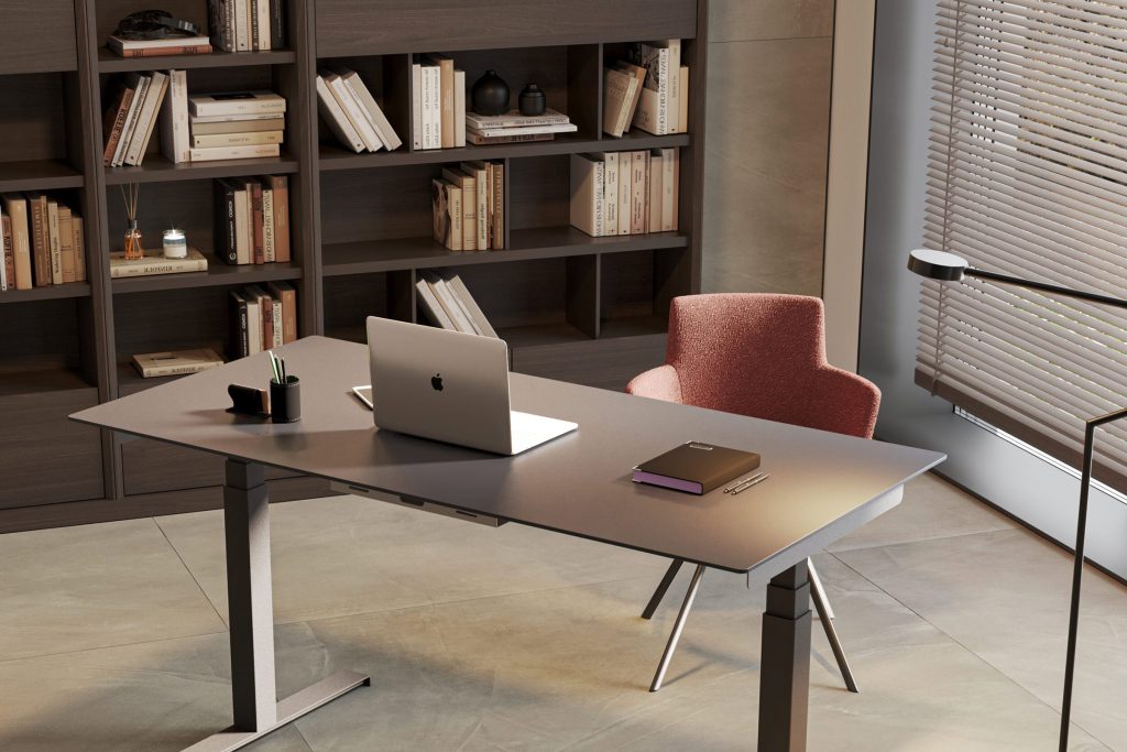 Modern office setup with sleek adjustable desk, elegant bookshelf, blush chair. Luxurious interior by LEOPARD Furniture Canada.