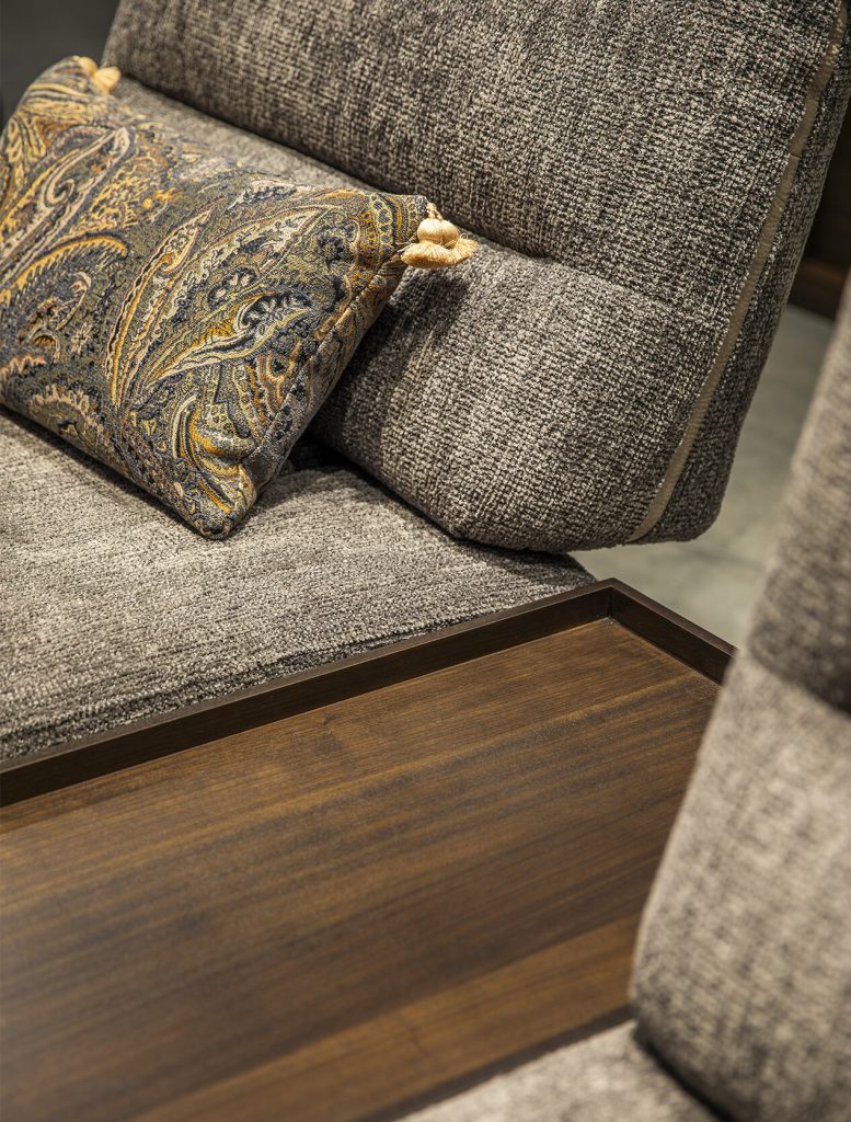 Elegant sectional sofa with paisley cushion by LEOPARD Furniture, showcasing premium modern design and comfort.