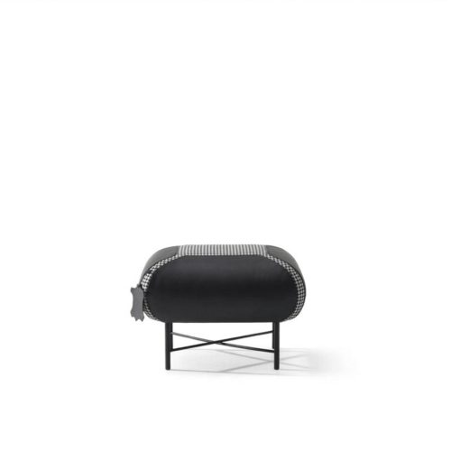 Luxury modern black ottoman by LEOPARD Furniture on white background. High-end interior design seating.