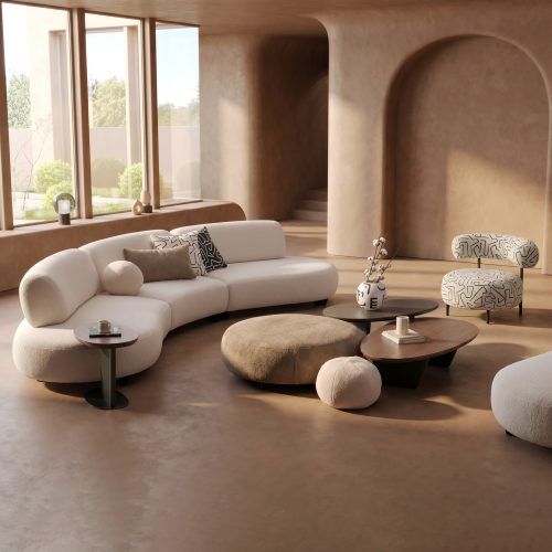 Elegant curve sectional sofa with modern chairs in a minimalist living room by LEOPARD Furniture Canada.