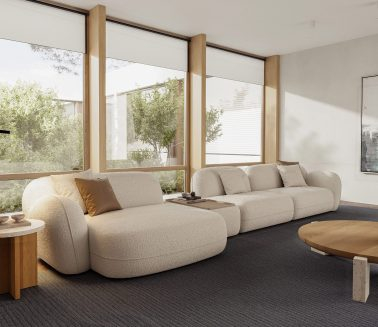 Canapé sectionnel beige moderne et table basse ronde dans un salon élégant par LEOPARD Furniture, Canada.