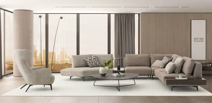 The Loft Modular Sofa in a modern living space with a off white rug and a minimalist coffee table